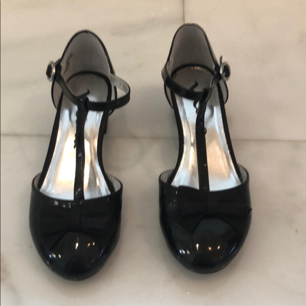 Little girl patent leather “high heels”